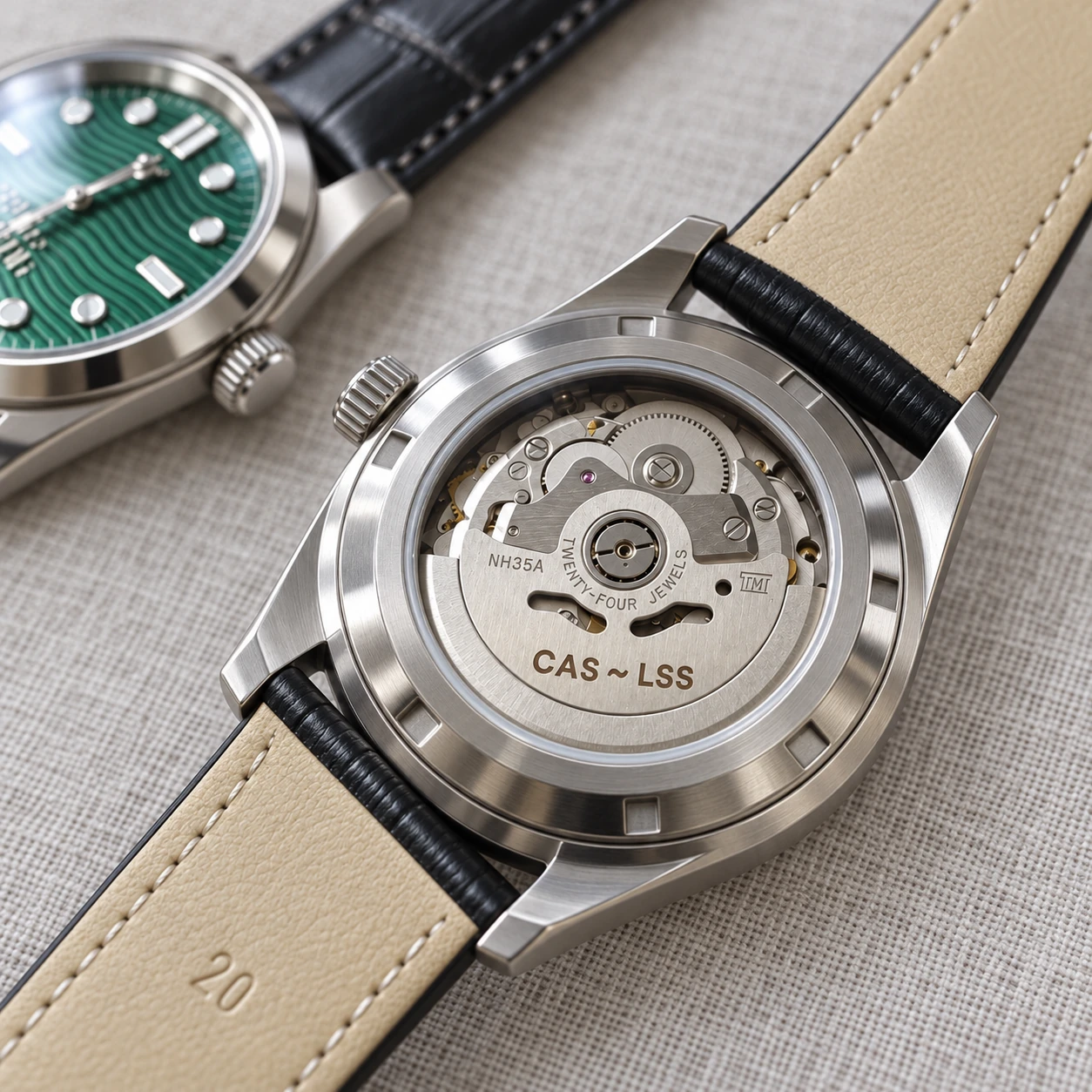 Natural-light view of a personalized exhibition caseback with CAS ~ LSS rotor lettering